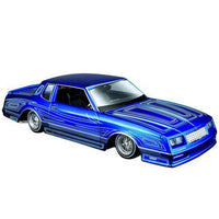 Maisto Design Lowriders 1986 Chevrolet Monte Carlo SS Candy Blue 1/24